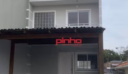 Casa Geminada com 2 dormitórios à venda, 69 m² por R$ 359.900 - Forquilhas - São José/SC