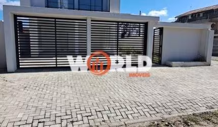 Triplex a uma quadra do mar financiavel