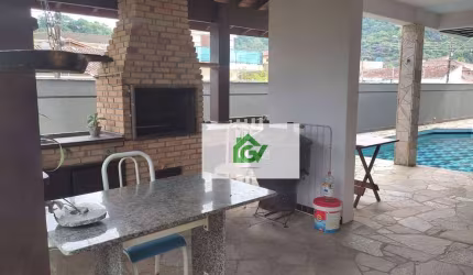 Sobrado com 4 dormitórios à venda, 369 m² por R$ 1.600.000,00 - Centro - Caraguatatuba/SP