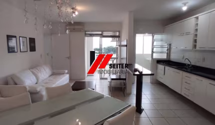 Apartamento de 2 quartos com suite e sacada com churrassqueira para locação Itacorubi Florianopolis