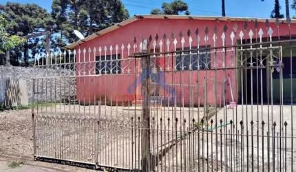 Casa em Piraquara com Terreno Amplo e Potencial de Renda!