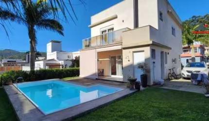 Casa em condomínio fechado com 4 quartos à venda na Rua Leonel Pereira, 2239, Cachoeira do Bom Jesus, Florianópolis, 200 m2 por R$ 2.100.000