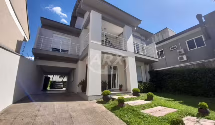 Casa com 4 quartos à venda na Rua Tenente Antônio João, 785, Nossa Senhora das Graças, Canoas por R$ 1.790.000