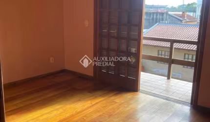 Casa com 3 quartos à venda na Rua Antônio G. da Cunha, 48, Santo Onofre, Viamão, 140 m2 por R$ 449.000