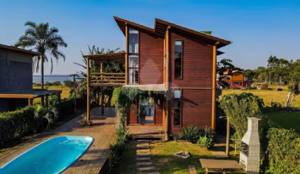 Casa em condomínio fechado com 3 quartos à venda na Manoel Irineu Gonçalves, 1, Ibiraquera, Imbituba por R$ 960.000