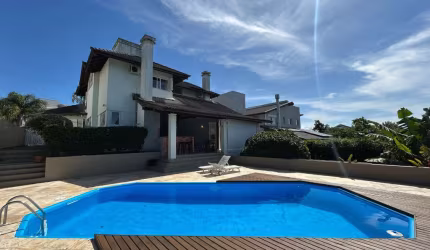 Casa em condomínio fechado com 3 quartos à venda na Rodovia Haroldo Soares Glavan, 3820, Cacupé, Florianópolis por R$ 2.950.000