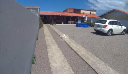 CASA NA PRAIA DE FORA EM PALHOÇA,2 DORMITÓRIOS, VARANDA, AMPLO TERRENO NA FRENTE