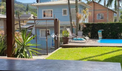 Casa com 3 quartos à venda na Condomínio Canto da Lagoa, 323, Lagoa da Conceição, Florianópolis, 180 m2 por R$ 1.800.000