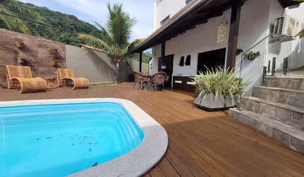 Casa em condomínio fechado com 4 quartos à venda na Avenida das Arapongas, 455, Ariribá, Balneário Camboriú por R$ 4.190.000