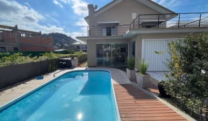 Casa em condomínio fechado com 3 quartos para alugar na Avenida Marcio Ferreira de Mello e Silva, 125, Praia Brava, Itajaí, 200 m2 por R$ 32.000