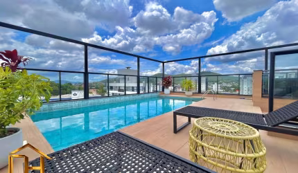 Apartamento studio com 1 vaga de garagem em excelente localização no Saguaçu que permite locação Airbnb!