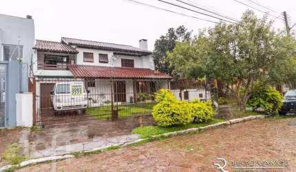 Casa com 4 quartos à venda na Rua Waldomiro Schapke, 311, Partenon, Porto Alegre, 260 m2 por R$ 890.000