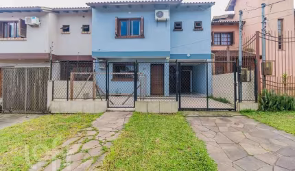 Casa com 3 quartos à venda na Rua Maria Elaine Wotter, 26, Rubem Berta, Porto Alegre, 135 m2 por R$ 415.000
