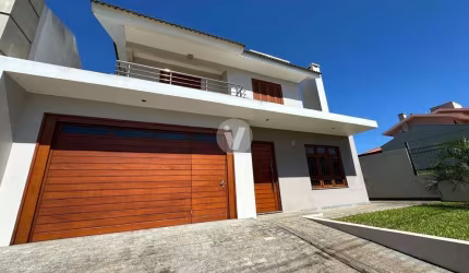 Linda casa 3 dormitórios em Camobi!