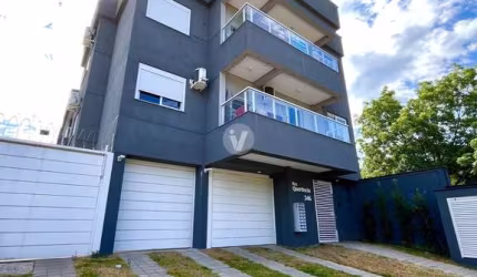 Apartamento 2 dormitórios com suíte, sacada, churrasqueira e garagem