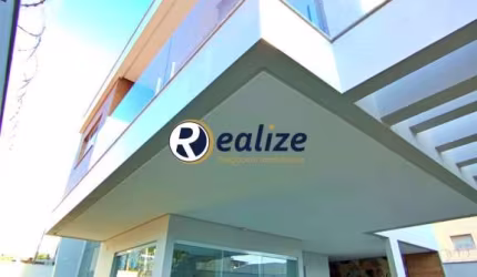 Casa Duplex composto por 3 quartos com Área Gourmet á venda no Bairro Itapebussu, Guarapari-ES - Realize Negócios Imobiliários.