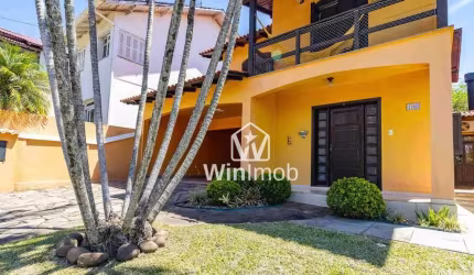 Casa com 4 dormitórios à venda, 210 m² por R$ 850.000 - Condomínio Cantegril- Viamão