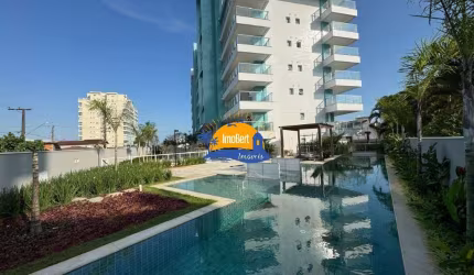 Apartamento novo à venda em Bertioga-SP, bairro Maitinga, 50 mts da praia, 2 quartos, (sendo 1 suíte), ampla sacada gourmet, 2 vagas, 82m²!