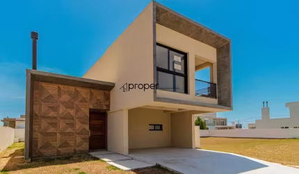Casa com 3 dormitórios, 230 m² por R$ 1.600.000,00 - Alphaville - Pelotas/RS