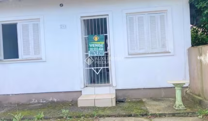 Casa com 2 quartos à venda na Rua Irerês, 283, Jardim Algarve, Alvorada, 78 m2 por R$ 300.000