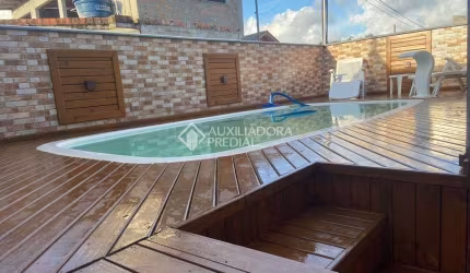 Casa com 3 quartos à venda na Rodovia Evádio Paulo Broering, 5236, Passagem de Maciambú (Ens Brito), Palhoça, 63 m2 por R$ 399.000