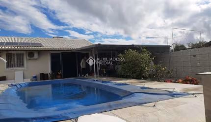 Casa com 3 quartos à venda na Rua Itapema, 337, Praia do Sonho, Palhoça, 180 m2 por R$ 750.000