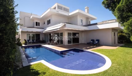Casa com 4 quartos à venda na Avenida dos Dourados, 201, Jurerê Internacional, Florianópolis, 470 m2 por R$ 7.700.000