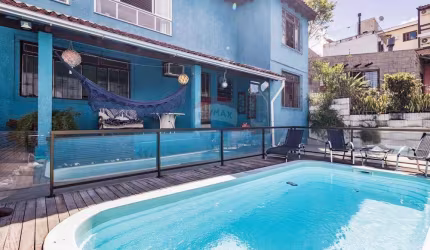 Casa à venda com 4 dormitórios, 1 suíte master no bairro Partenon