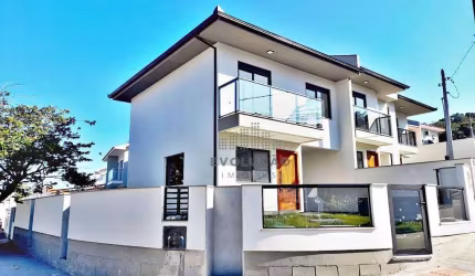Casa com 3 dormitórios à venda, 107 m² por R$ 659.000,00 - Potecas - São José/SC