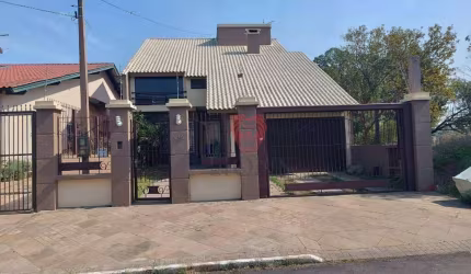 Sobrado com 4 dormitórios à venda, 226 m² por R$ 1.100.000,00 - Dom Feliciano - Gravataí/RS