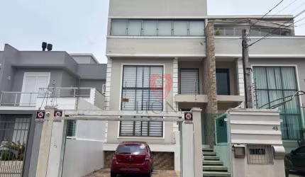Triplex com 3 dormitórios à venda, 157 m² por R$ 734.000 - Dom Feliciano - Gravataí/RS