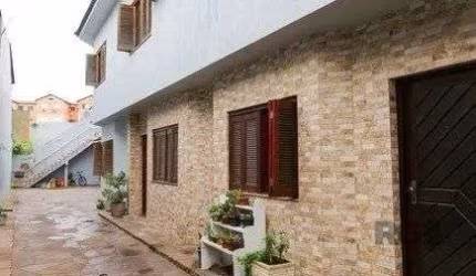Casa em condomínio com 3 dormitórios, 1 vaga no bairro Nossa Senhora das Graças, Canoas!