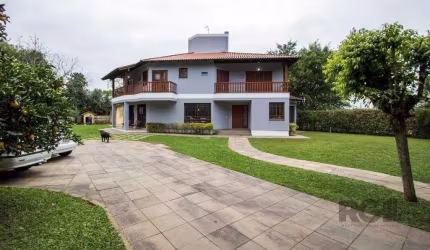 Sobrado com 6 suites, lareira, lavabo, pátio - Bairro Belém Velho