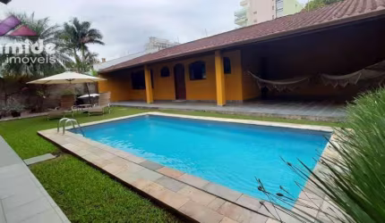 Casa com 3 dormitórios à venda, 220 m² por R$ 1.000.000,00 - Indaiá - Caraguatatuba/SP