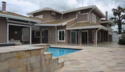 Casa de alto padrão em condomínio no Loteamento Alphaville Campinas para locação: 4 quartos, 4 suítes, 3 salas, 6 banheiros, 4 vagas e 600m².
