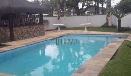 Casa com 5 dormitórios para alugar, 400 m² por R$ 14.000,02/mês - Jardim Acapulco - Guarujá/SP