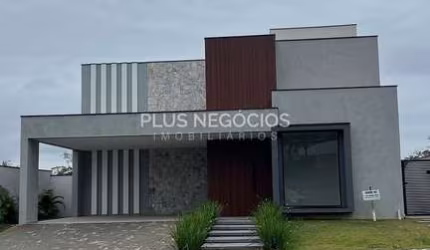 Exclusividade e Sofisticação: Casa de Condomínio com Piscina de Borda Infinita em Alphaville Nova E