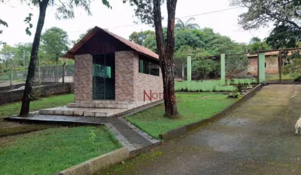 Casa com 3 dormitórios à venda, 200 m² por R$ 750.000,00 - Condomínio Rancho Grande - Mateus Leme/MG