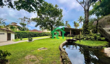 Casa a uma quadra da Praia, 3 dormitórios - Espaço gourmet - 6 vagas - Jardim Guaiuba - Guarujá/SP