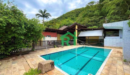 Casa á venda na Praia do Guaiuba | Rocha Imóveis Guarujá
