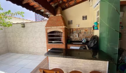 Sobrado com 3 dormitórios à venda, 154 m² por R$ 750.000,00 - Tupi - Praia Grande/SP