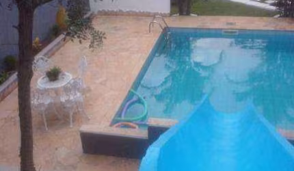Casa com 3 dormitórios à venda, 191 m² por R$ 1.400.000,00 - Condomínio Reserva Ibirapitanga - Santa Isabel/SP