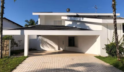Casa com 4 dormitórios, 407 m² - venda por R$ 2.500.000,00 ou aluguel por R$ 10.000,00/mês - Jardim Acapulco - Guarujá/SP