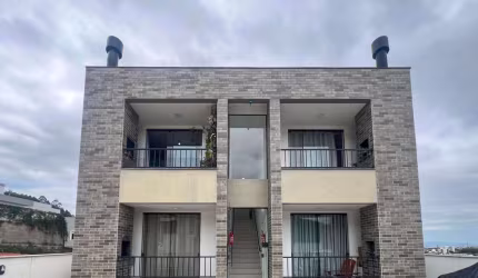 APARTAMENTO COM 2 QUARTOS SENDO 1 SUITE NA PALHOÇA/SC