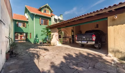 Casa com 4 quartos à venda na Beco Circular, 722, Vila Jardim, Porto Alegre por R$ 799.900