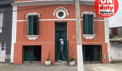 Sobrado com 3 dormitórios à venda, 220 m² por R$ 390.000,00 - Vila Matias - Santos/SP