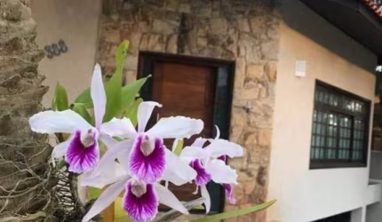Casa com 3 dormitórios à venda, 323 m² por R$ 1.760.000,00 - Country Club Santa Isabel - Santa Isabel/SP