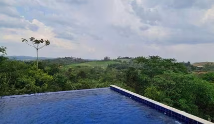 Casa com 3 dormitórios, 350 m² - venda por R$ 2.450.000,00 ou aluguel por R$ 10.500,00/mês - Condomínio Reserva Ibirapitanga - Santa Isabel/SP