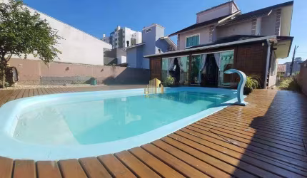 Casa à venda, no Bairro Pedra Branca, Palhoça-SC, com 4 quartos, sendo 1 suíte, com 2 vagas