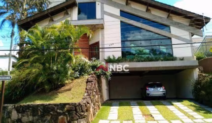 Casa com 3 dormitórios à venda, 400 m² por R$ 3.150.000,00 - Condomínio IV - Arujá/SP